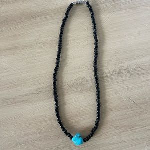 Handmade beaded choker necklaces.
